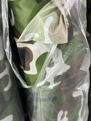 May bạt dù quân đội tại xưởng ở TPHCM